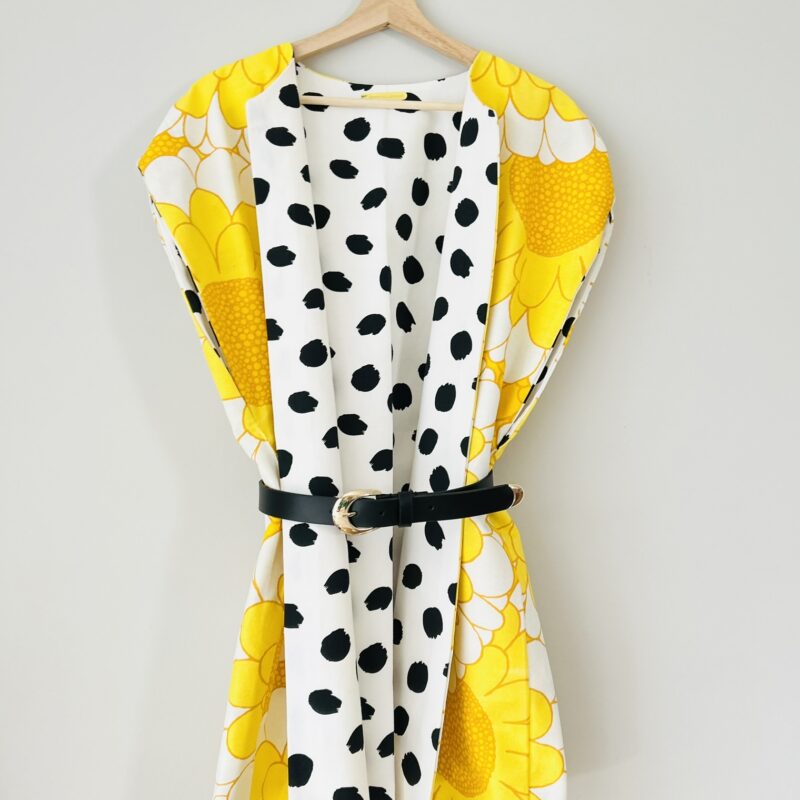 Reversible cotton vest with yellow sunflower print and black polka dot